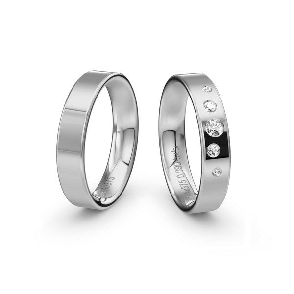 Romantiske Siersbøl vielsesringe i 14 karat hvidguld med fem diamanter i stjernedrys fra Siersbøl Wedding.